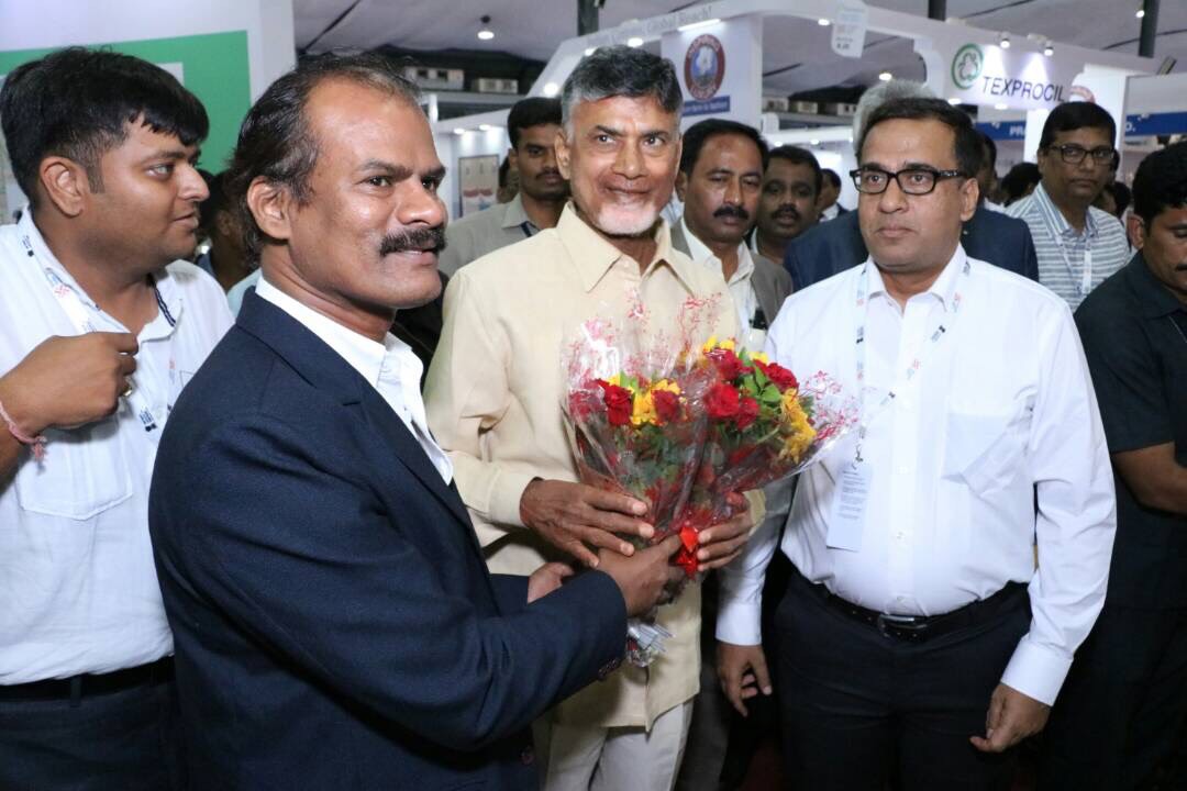 Shri A. Sukumar CGM WRO, NTCL and NTCL officials are welcoming the Honourable Chief Minister Of Andhra Pradesh Shri N. Chandrababu Naidu in the NTC stall during Mega Event Textiles India 2017.